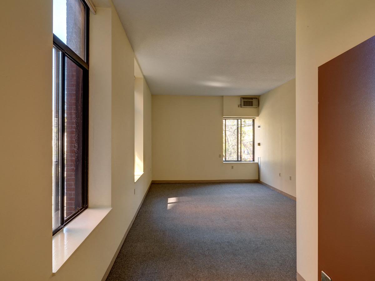 living room at Robinson Cuticura Mill Apartments in Malden , MA