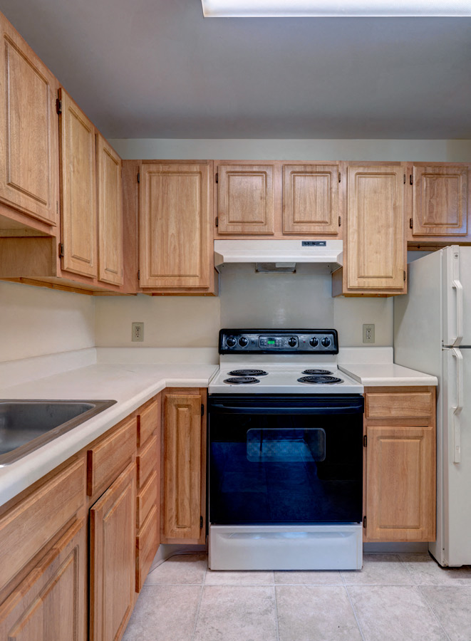 Kitchen  With Tile Flooring at Robinson Cuticura Mill Apartments in Malden , MA.
