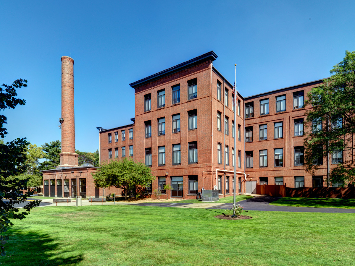 Exterior View of  Converted Mill and Now Senior Housing at Robinson Cuticura Mill Apartments in Malden , MA.