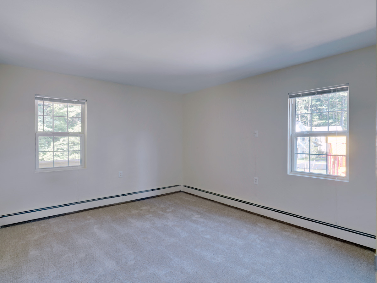 Bedroom at Wilkins Glen Apartments in Medfield, MA.