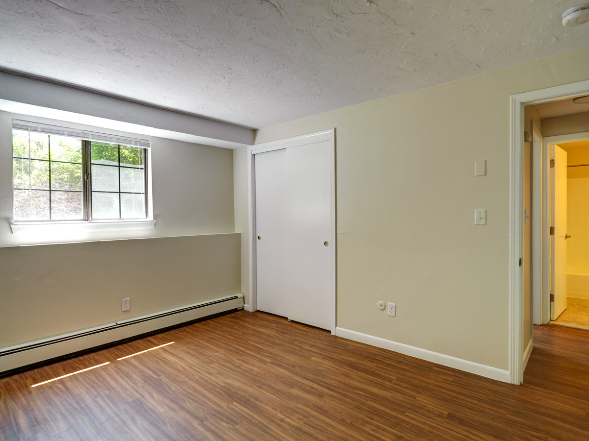 Bedroom with hardwood at Mansfield Meadows Apartments in Mansfield, MA
