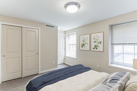 a bedroom with a closet and an open door at 13 State Street, Schenectady NY