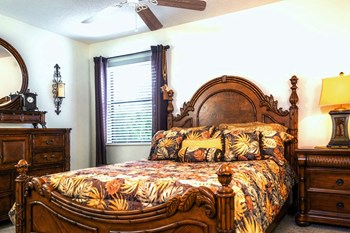 Master Bedroom at Fishermans Landing Apartments in Ormond Beach, FL. - Photo Gallery 8