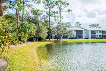 Pond at Fishermans Landing Apartments in Ormond Beach, FL. - Photo Gallery 15