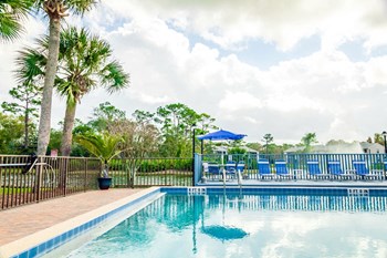 Outdoor Swimming Pool at Fishermans Landing Apartments in Ormond Beach, FL. - Photo Gallery 21