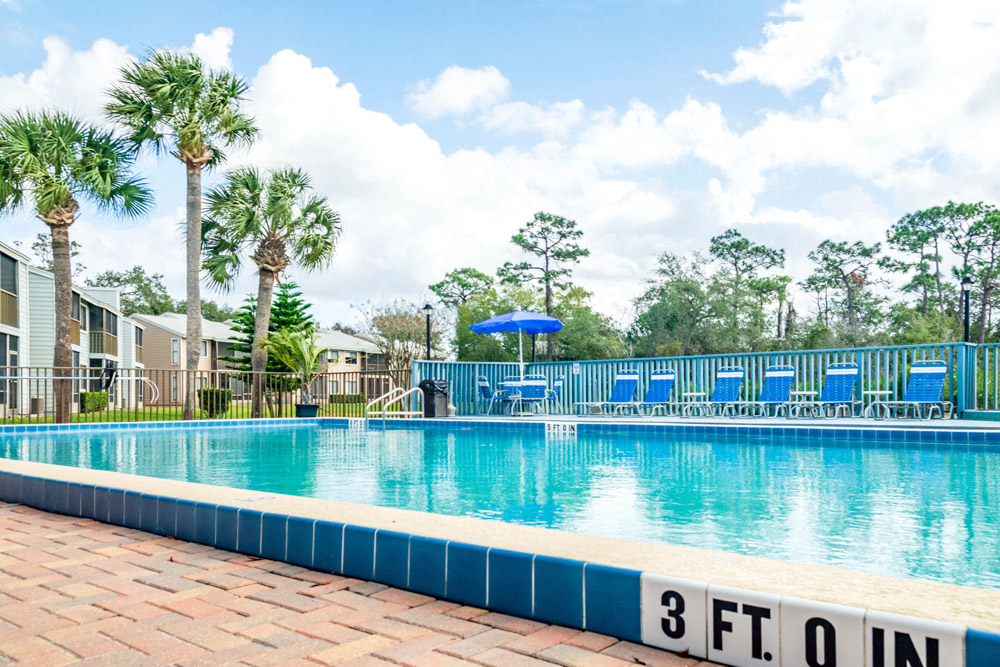Swimming Pool at Fishermans Landing Apartments in Ormond Beach, FL.