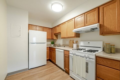 Fully Appliance Kitchen with Wood Cabinets. at Franklin Manor Apartments, Ohio, 43223