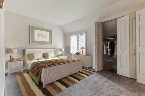 a bedroom with a bed and a closet  at Dillsburg Heights Apartments, Dillsburg, Pennsylvania