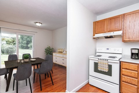Fully Applianced Kitchen and Dining Room at Rolling Green Apartments, Massachusetts, 01002