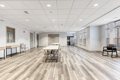 Resident Community Room With Seating and Kitchen at Niagara Square, Buffalo, 14201
