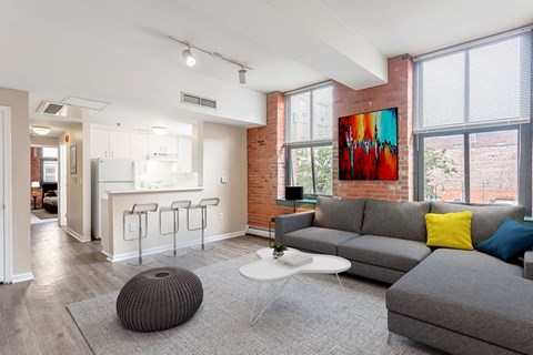 a living room with a couch and a table