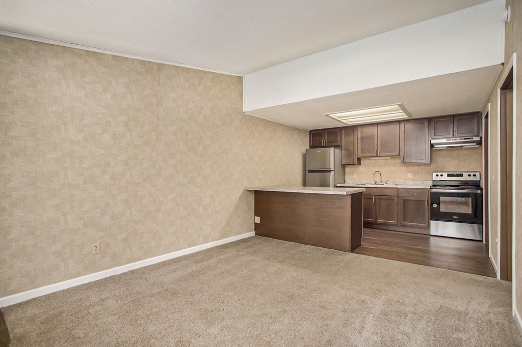 a kitchen and dining area in a 555 waverly unit