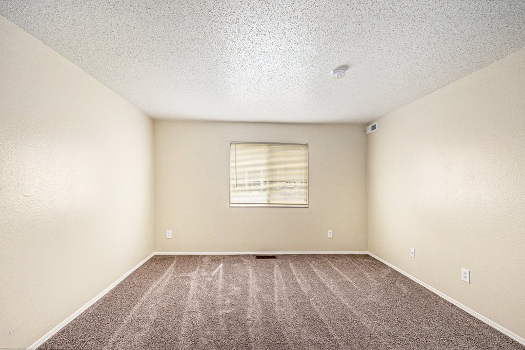 an empty room with a window