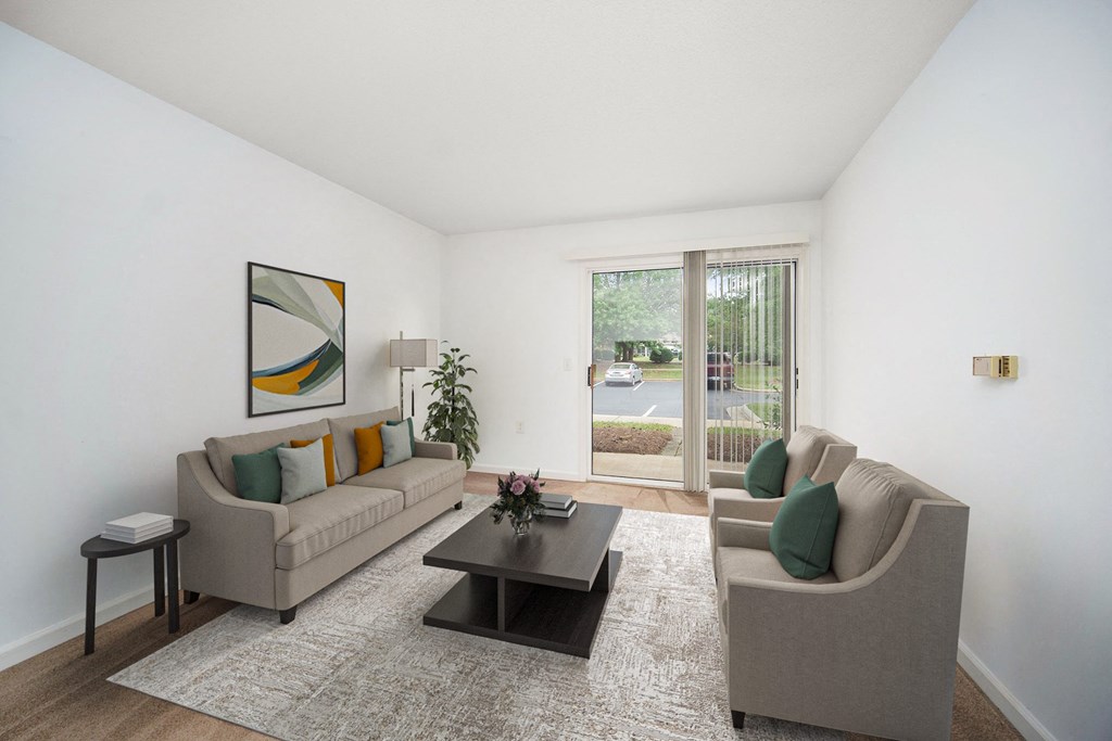 a living room with couches and a coffee table