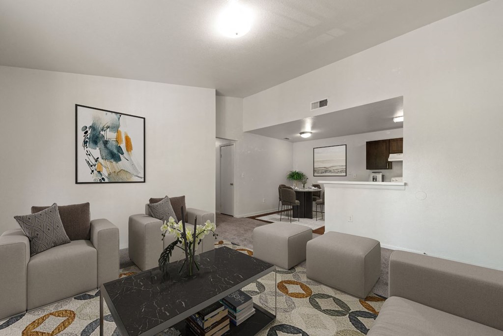 a living room with couches and a table