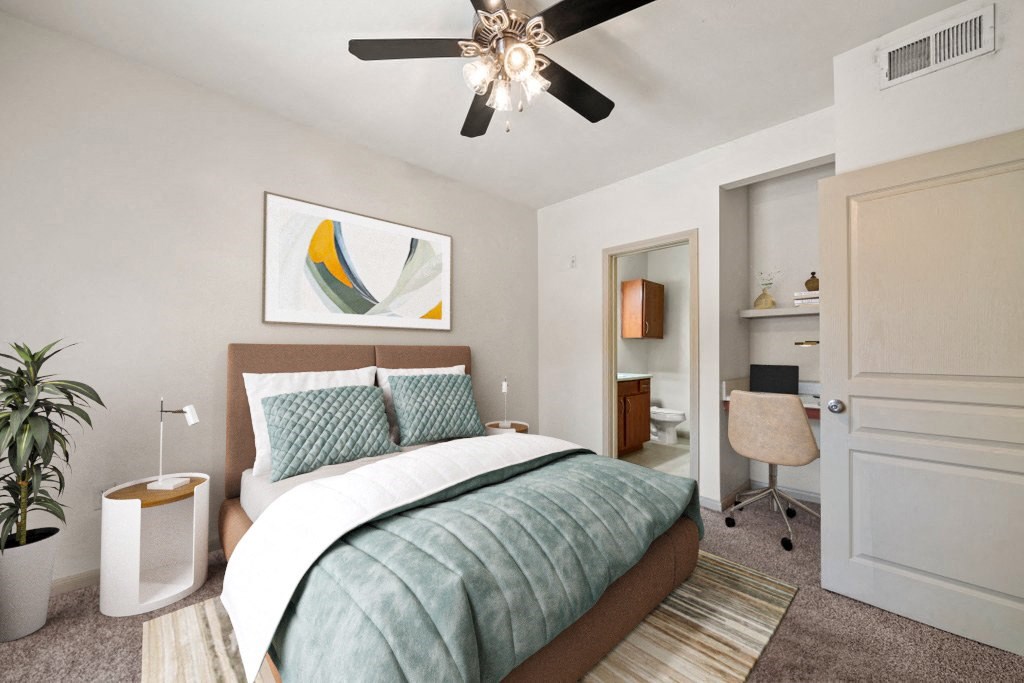 a bedroom with a bed and a ceiling fan