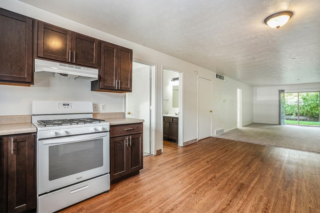 a kitchen and living room in a 555 waverly unit