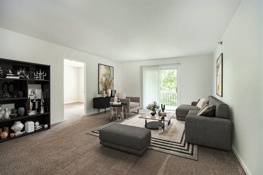 a living room with a couch and a table