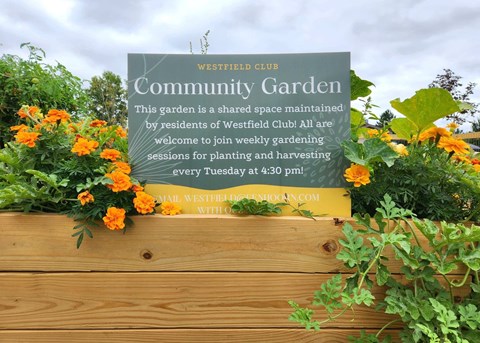 a sign for the community garden