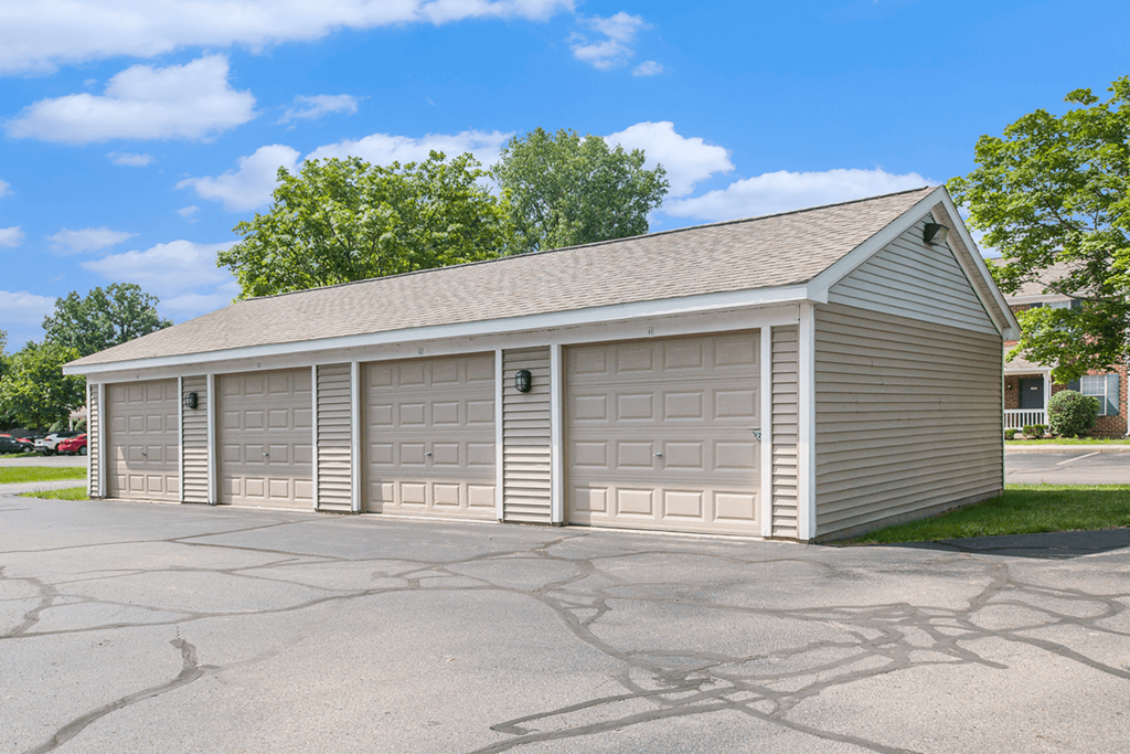 a three car garage with a garage door on each side of the garage