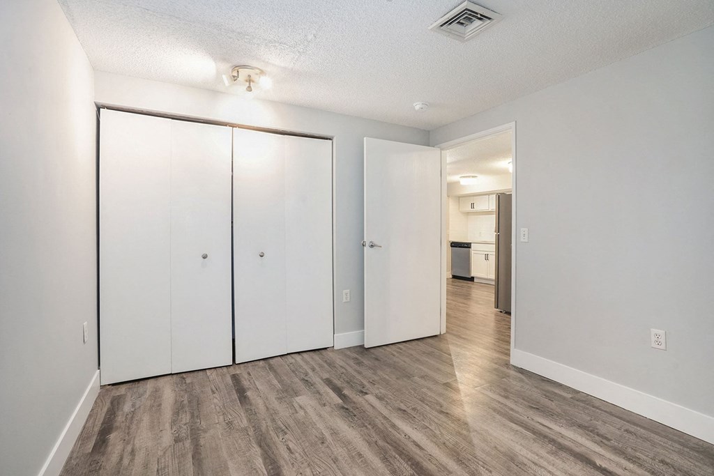 The Lofts Apartments in Grand Rapids, MI Spacious bedroom with upgraded hardwood flooring and walk in closet