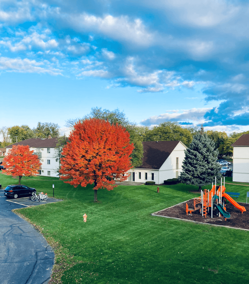 Sunflower Apartments Exterior Lawn & Playground - Photo Gallery