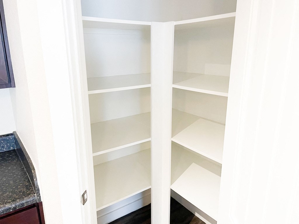 a built in bookcase in a kitchen