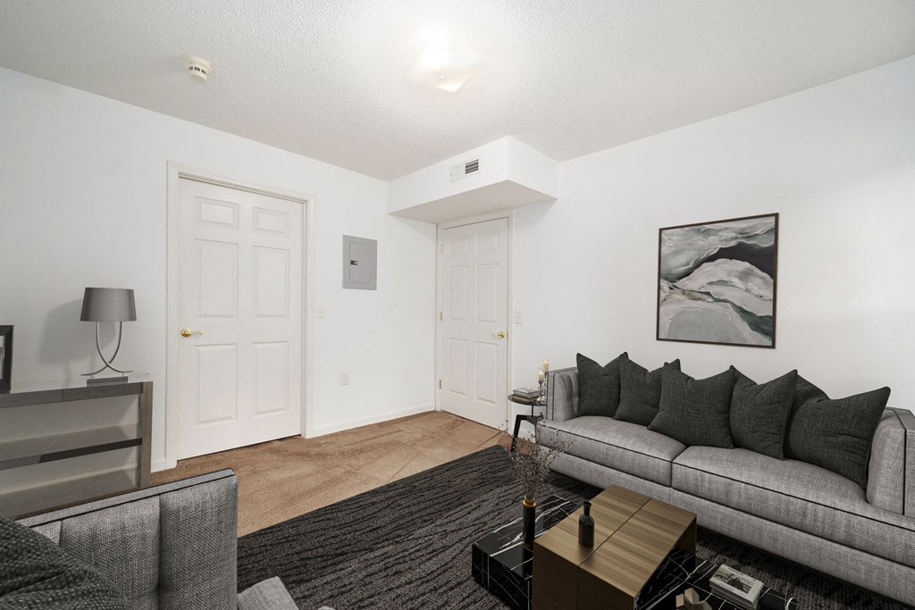 a living room with a couch and a coffee table