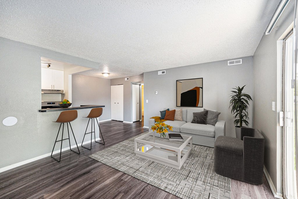 our apartments offer a living room with a couch and a table