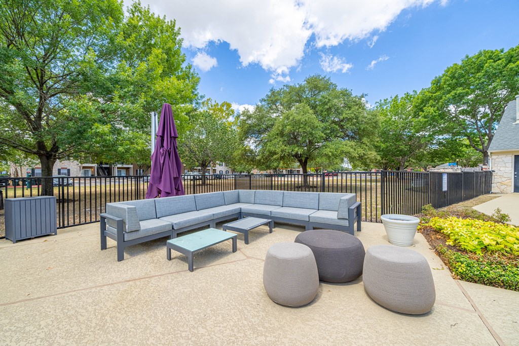 the reserve at bucklin hill leasing office patio with couches and tables