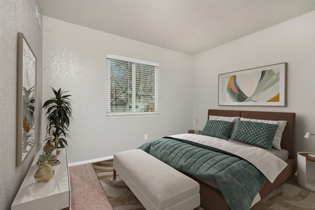 a bedroom with a bed and a window