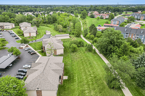 arial view of a neighborhood with houses and lawns