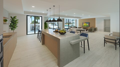 A modern kitchen with a dining area in the background.