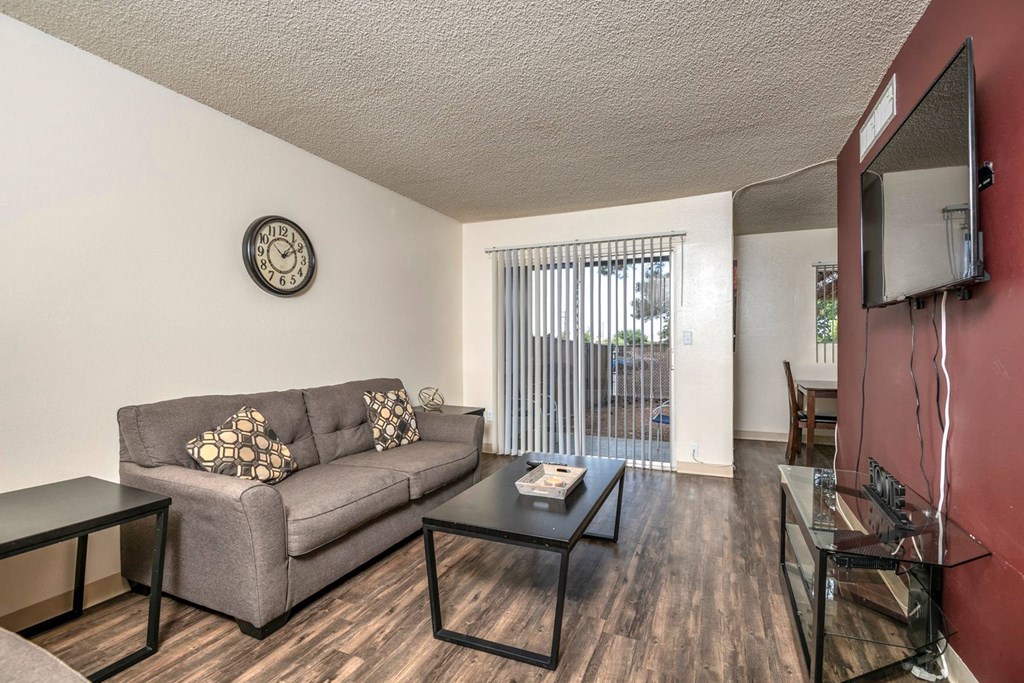 a living room with a couch and coffee table