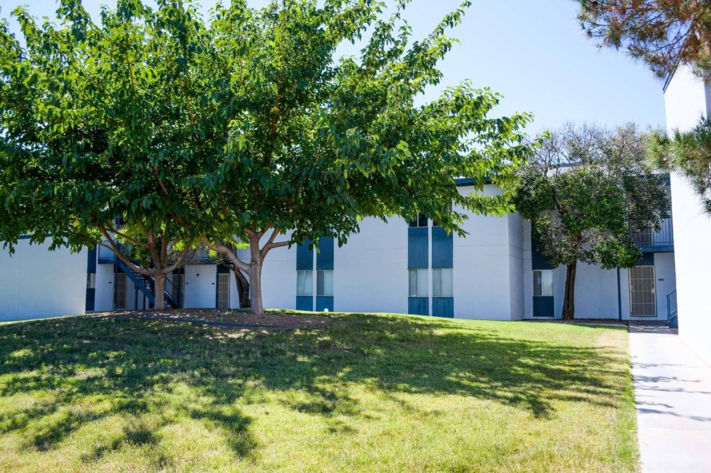 a building with trees in front of it