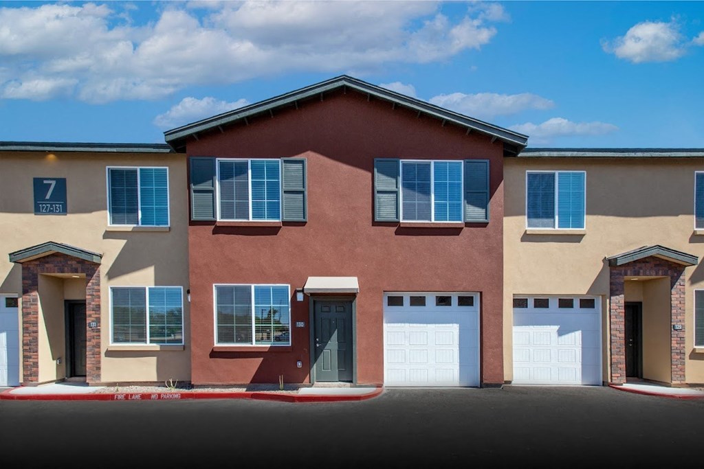 a house with solar panels on the side of it