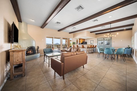 A living room with a fireplace and a couch.