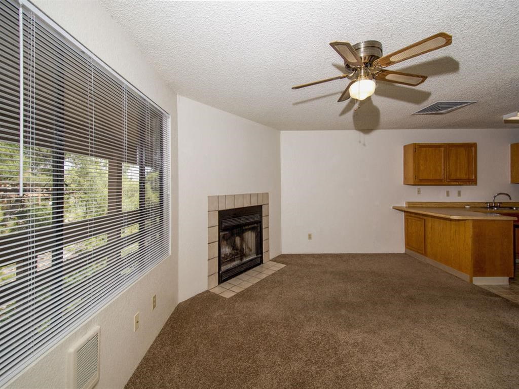 Living Area With Fireplace at Mountain View Villa Apartments, Cottonwood, AZ, 86326