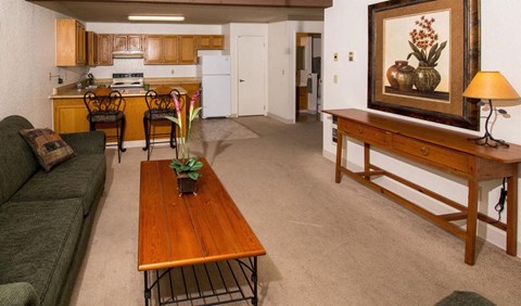 a living room with a couch and a coffee table