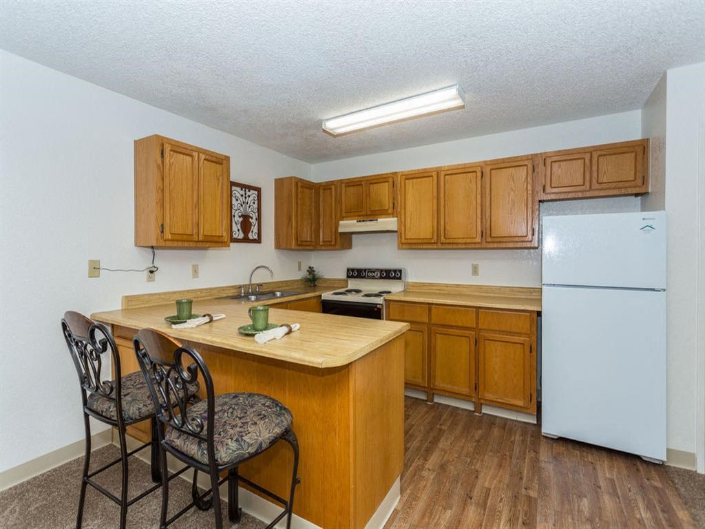 Fitted Kitchen With Island Dining at Mountain View Villa Apartments, Cottonwood, Arizona