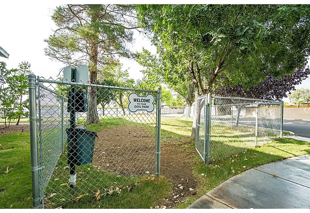 a chain link fence with a sign on it