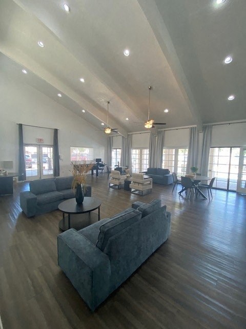 a large living room with couches and a table