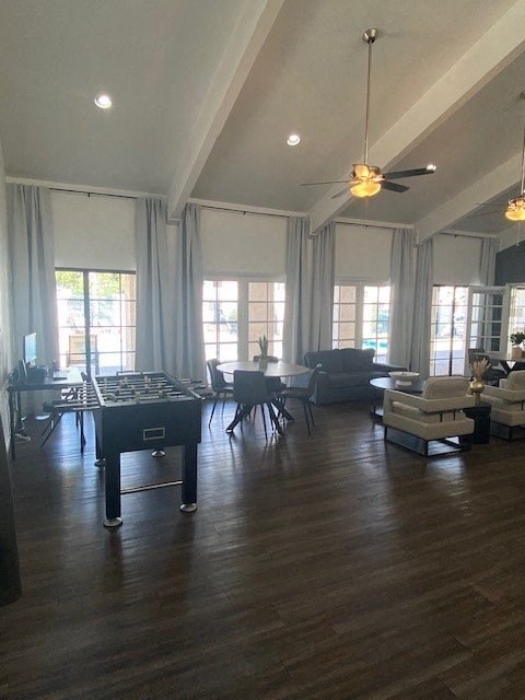 a large living room with a pool table