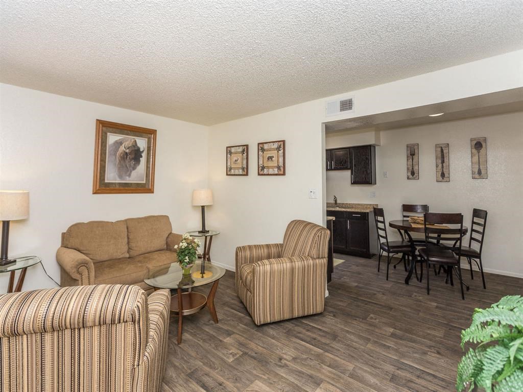 Living Room With Dining Area at Country Club Meadows Apartments, Arizona, 86004