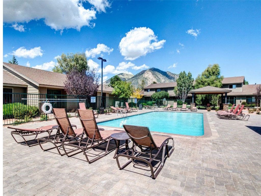 Poolside Sundeck And Grilling Area at Country Club Meadows Apartments, Arizona, 86004