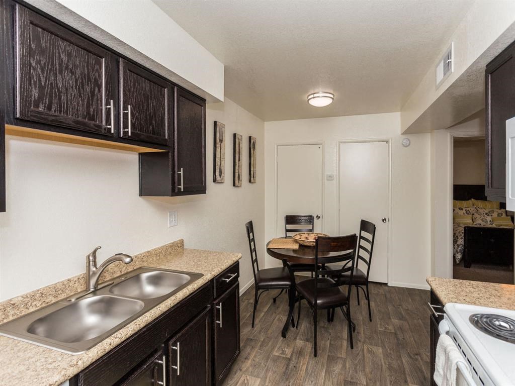 Well Equipped Kitchen And Dining at Country Club Meadows Apartments, Flagstaff, 86004
