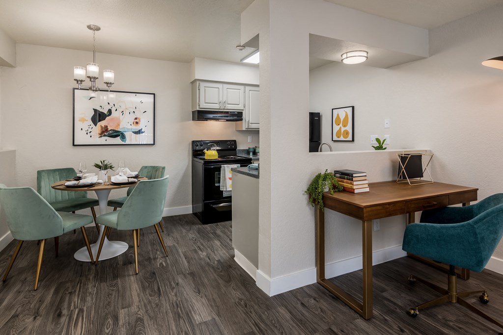 kitchen and dining area at the district flats apartments in lenexa, ks