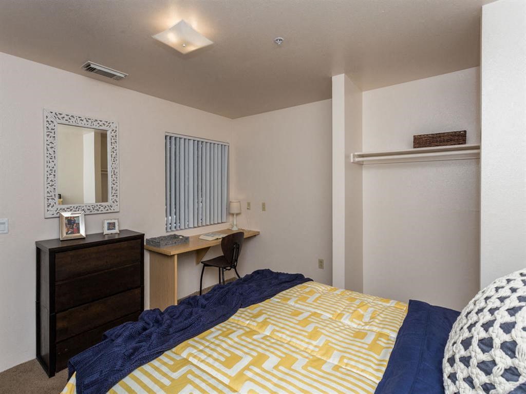 Comfortable Bedroom With Accessible Closet at Highland Village Apartments, Flagstaff, AZ