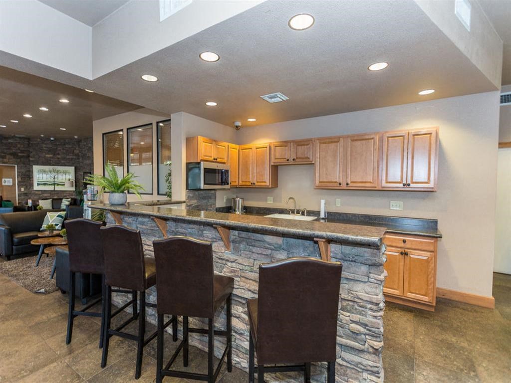 Eat-In Table With High Chairs In Clubhouse at Highland Village Apartments, Flagstaff