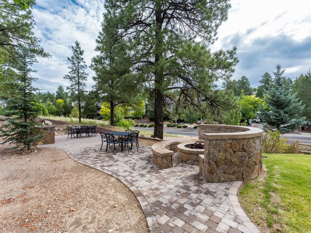 Outdoor Grill With Intimate Seating Area at Highland Village Apartments, Flagstaff